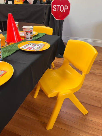 Yellow plastic hire chair digger theme
