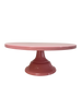 Pink cake stand on a white background